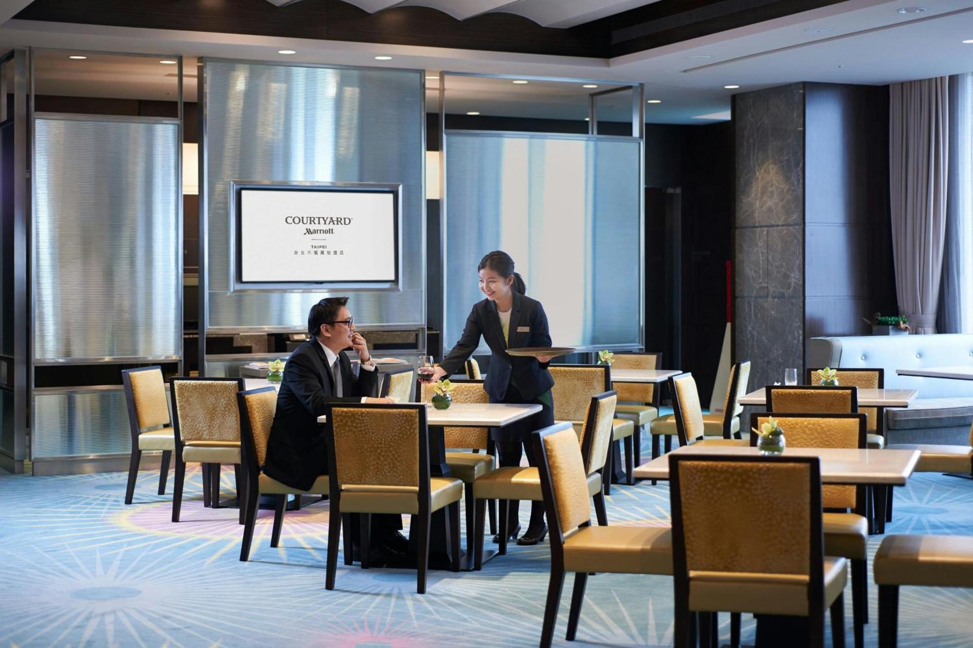 Courtyard By Marriott Taipei Hotel Exterior photo Concourse Lounge at Hong Kong International Airport